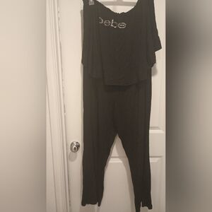 Bebe Black Sleeveless Jumpsuit with Scoop Neckline